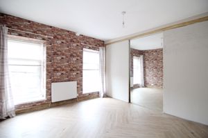 Bedroom One- click for photo gallery